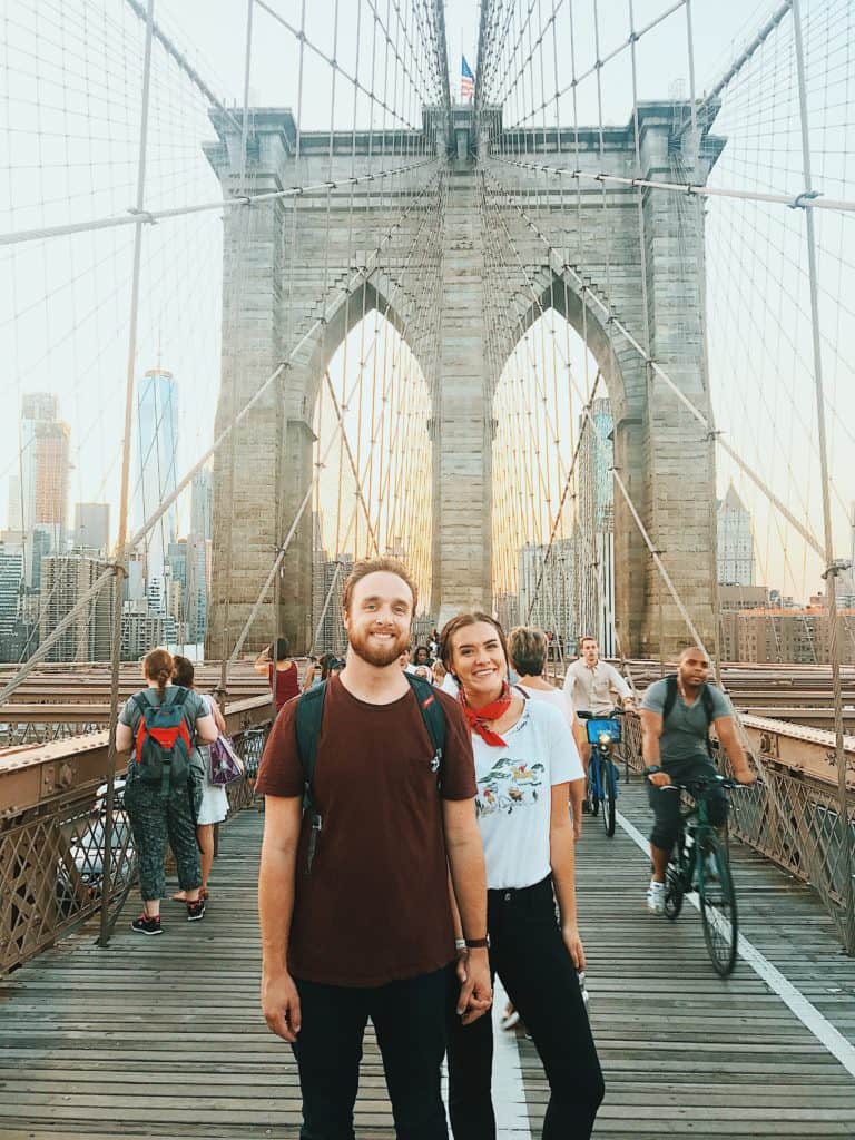 Mitch and Sarah of the Traveloars on the Brooklyn Bridge
